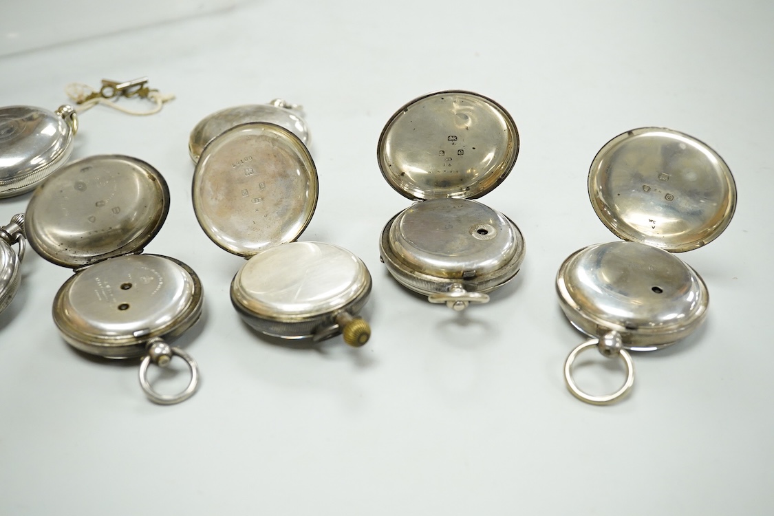 Seven assorted mainly early 20th century silver open faced pocket watches including a chronograph by William Williams of Bury, case diameter 53mm and one other silver pocket watch case(no movement).